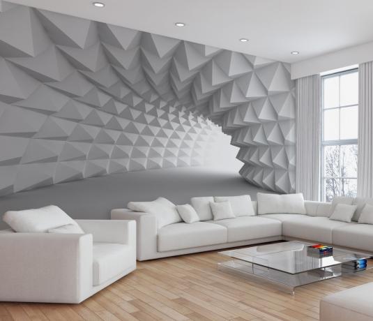 O papel de parede 3D cria o efeito de que a sala está em algum tipo de labirinto ou caverna